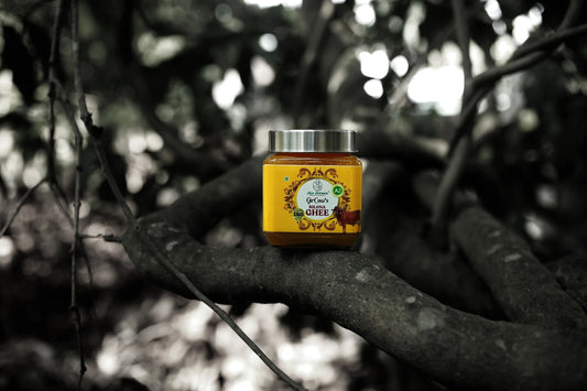 Pure A2 Bilona Ghee on a tree branch